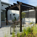 Massiivipuusta pergola. Hiilletty puu pergola. Musta pergola. 4 x 4m pergola. 400 x 400 cm pergola. Huoltovapaa ja ekologinen valinta. Laura Moilanen Huvila ja huussi ohjelmasta. 