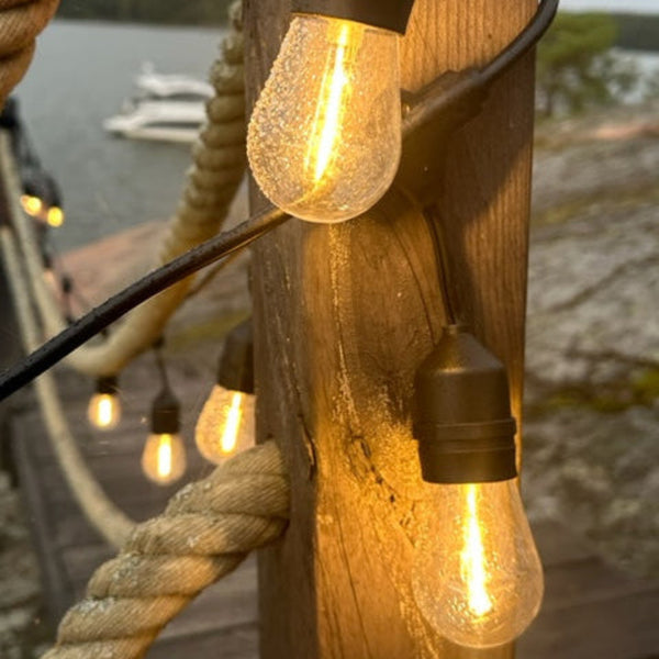 SELED ULKOVALOSARJA /VALOKETJU ULKOKÄYTTÖÖN VAIHDETTAVILLA E27 LED -LAMPUILLA. 10m / 10 lamppua